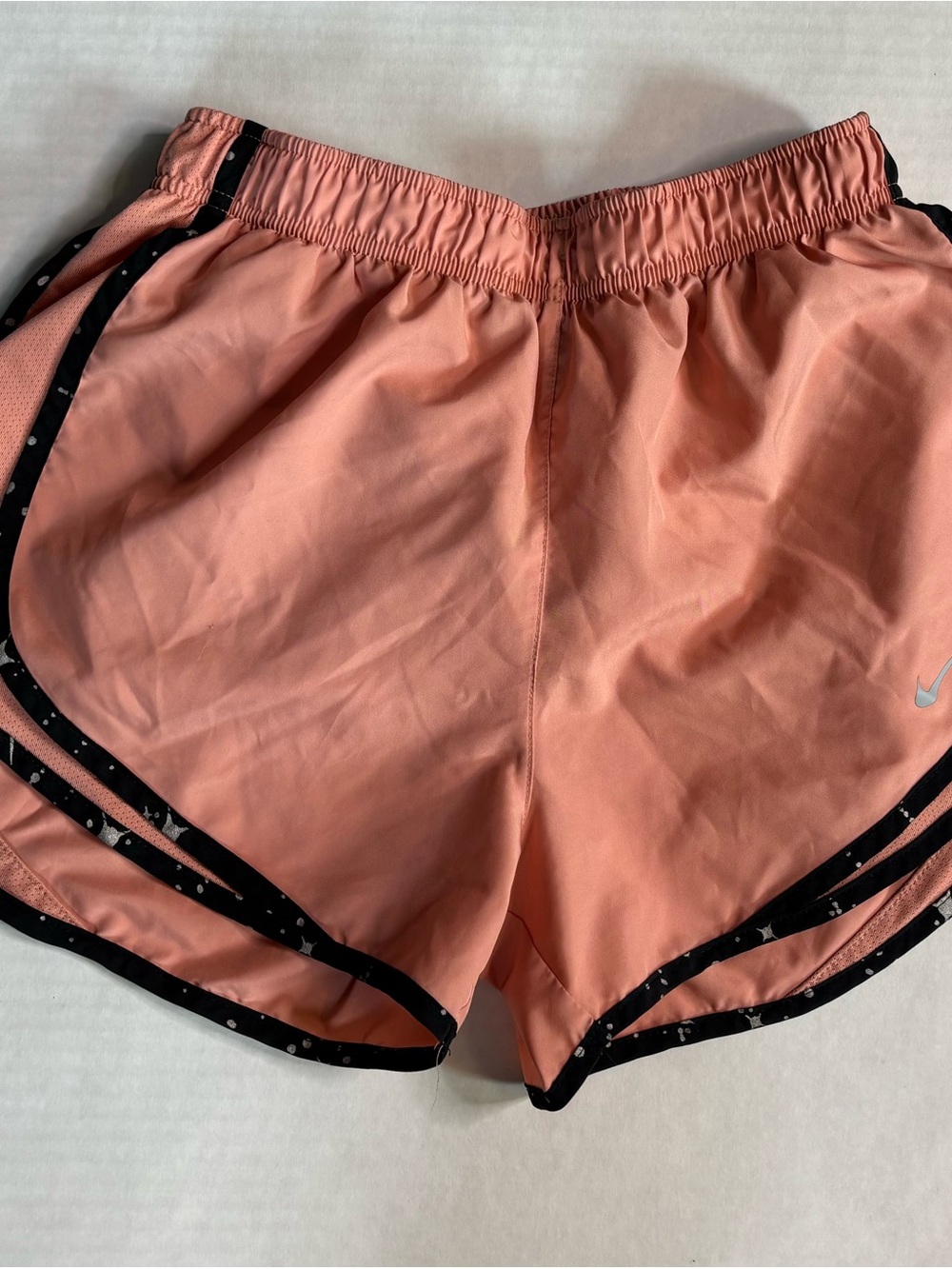 Small Nike pink Coral Athletic Running Shorts with Black paint splatter Trim